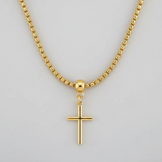 Gold necklace with a cross pendant on a white background
